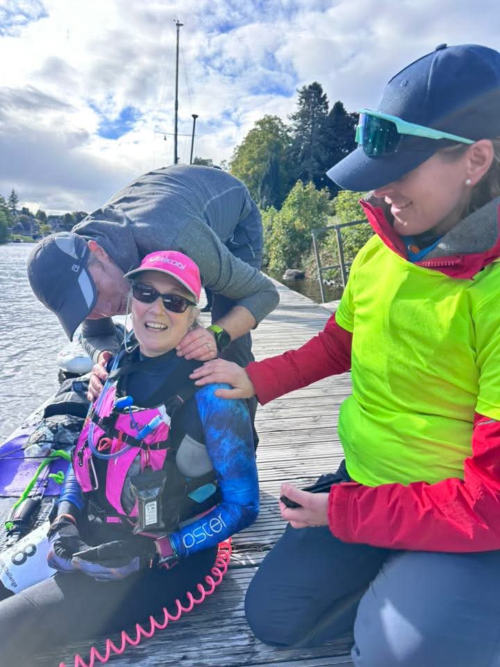 Kim on the pontoon with Richard and Emma